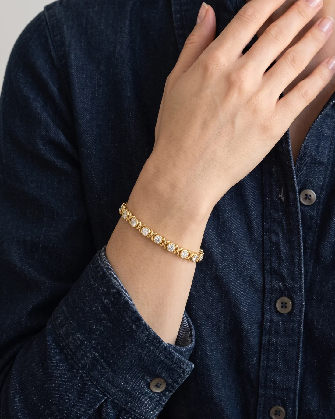 ORTIGAS Cross Link Line bracelet, worn on the wrist