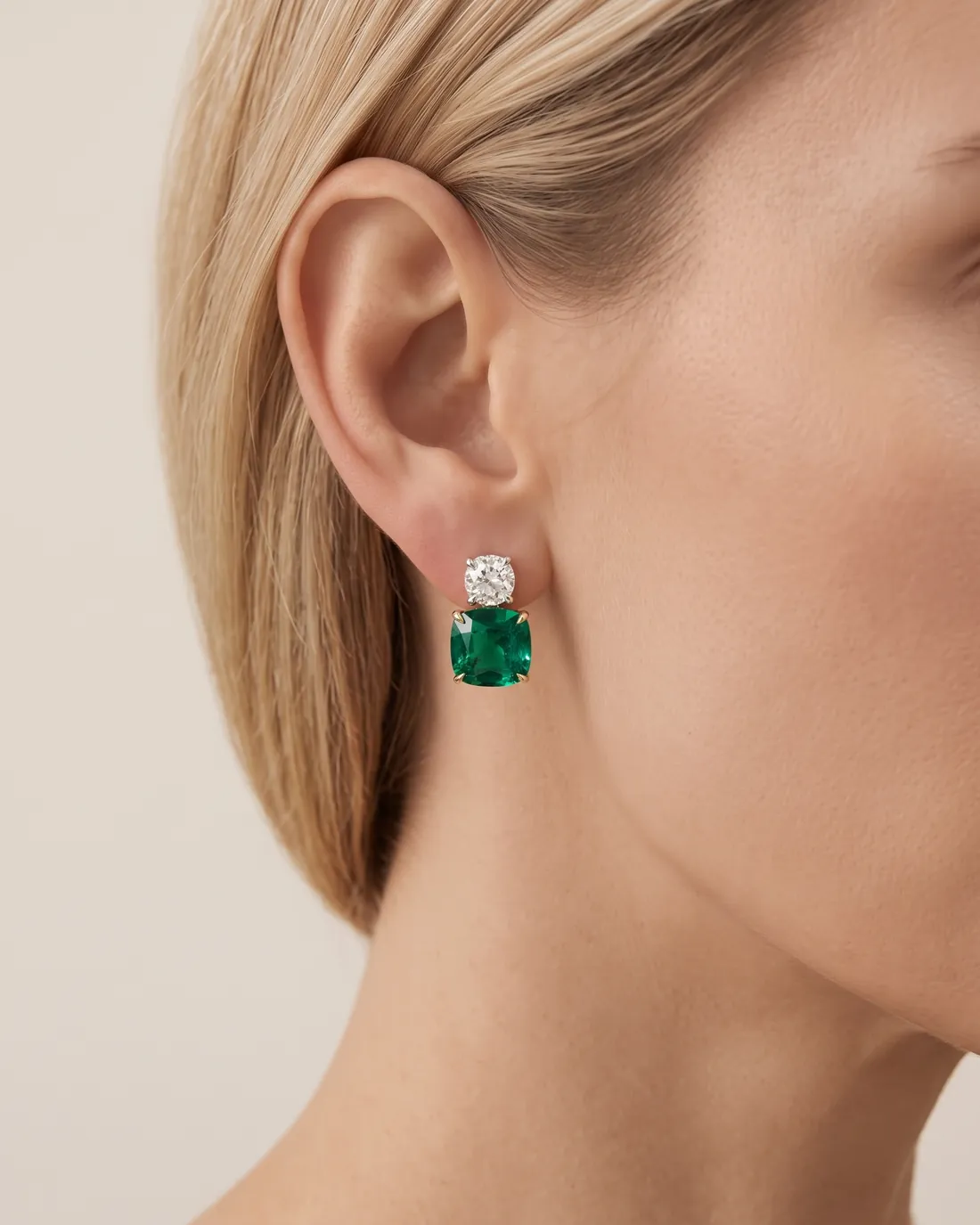 ORTIGAS Emerald Toi et Moi earrings, worn on the ear