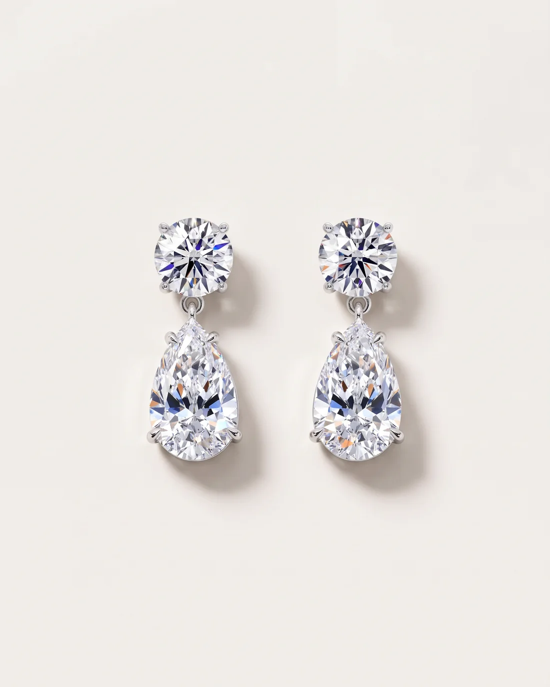 ORTIGAS Pear Drops earrings, front view