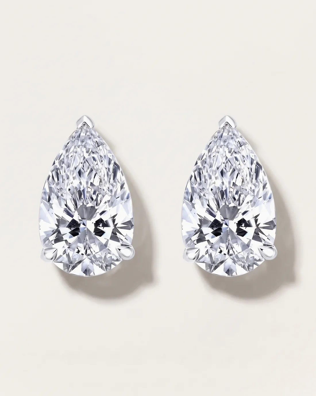 ORTIGAS Pear Studs earrings, front view