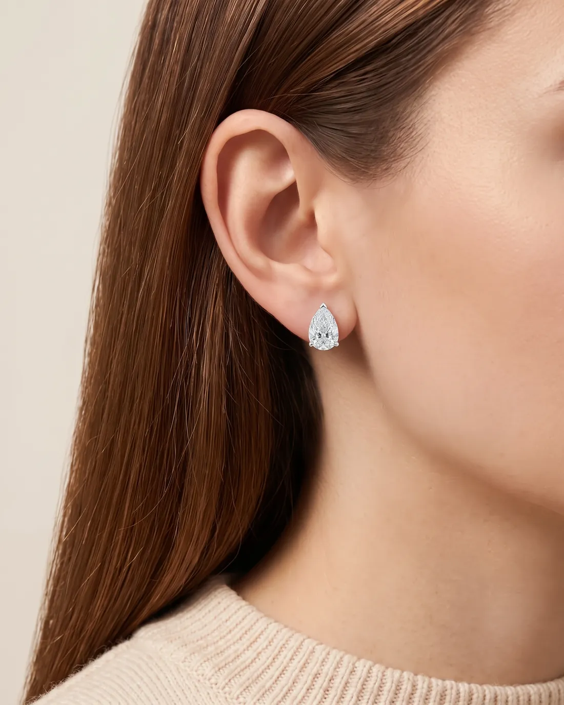 ORTIGAS Pear Studs earrings, worn on the ear