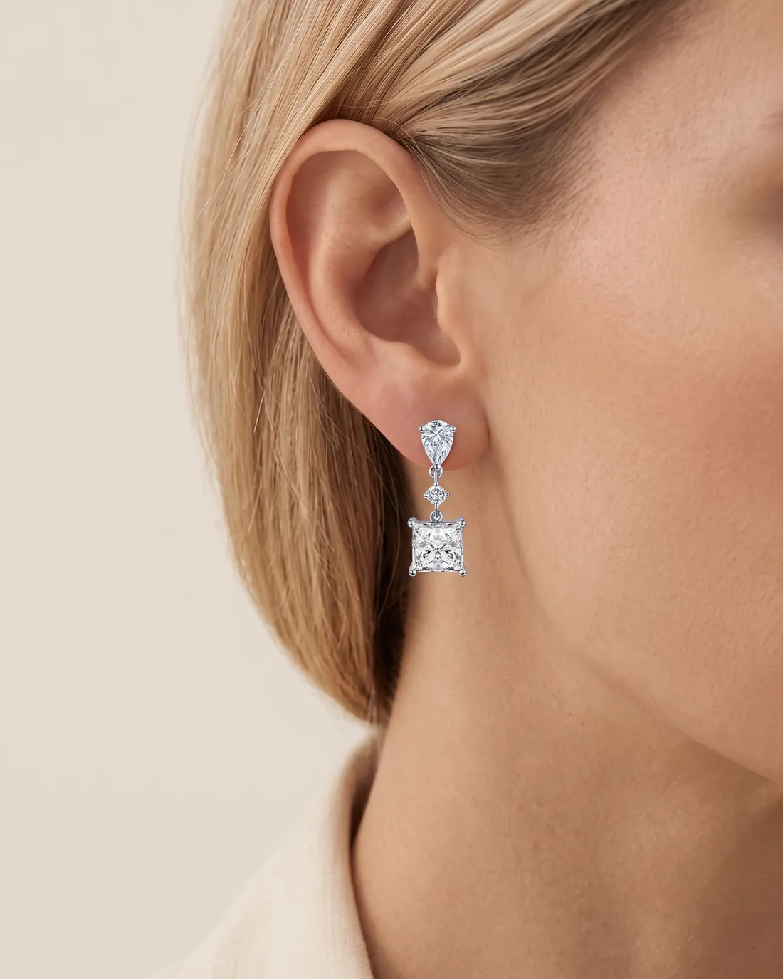 ORTIGAS Princess Drops earrings, worn on the ear