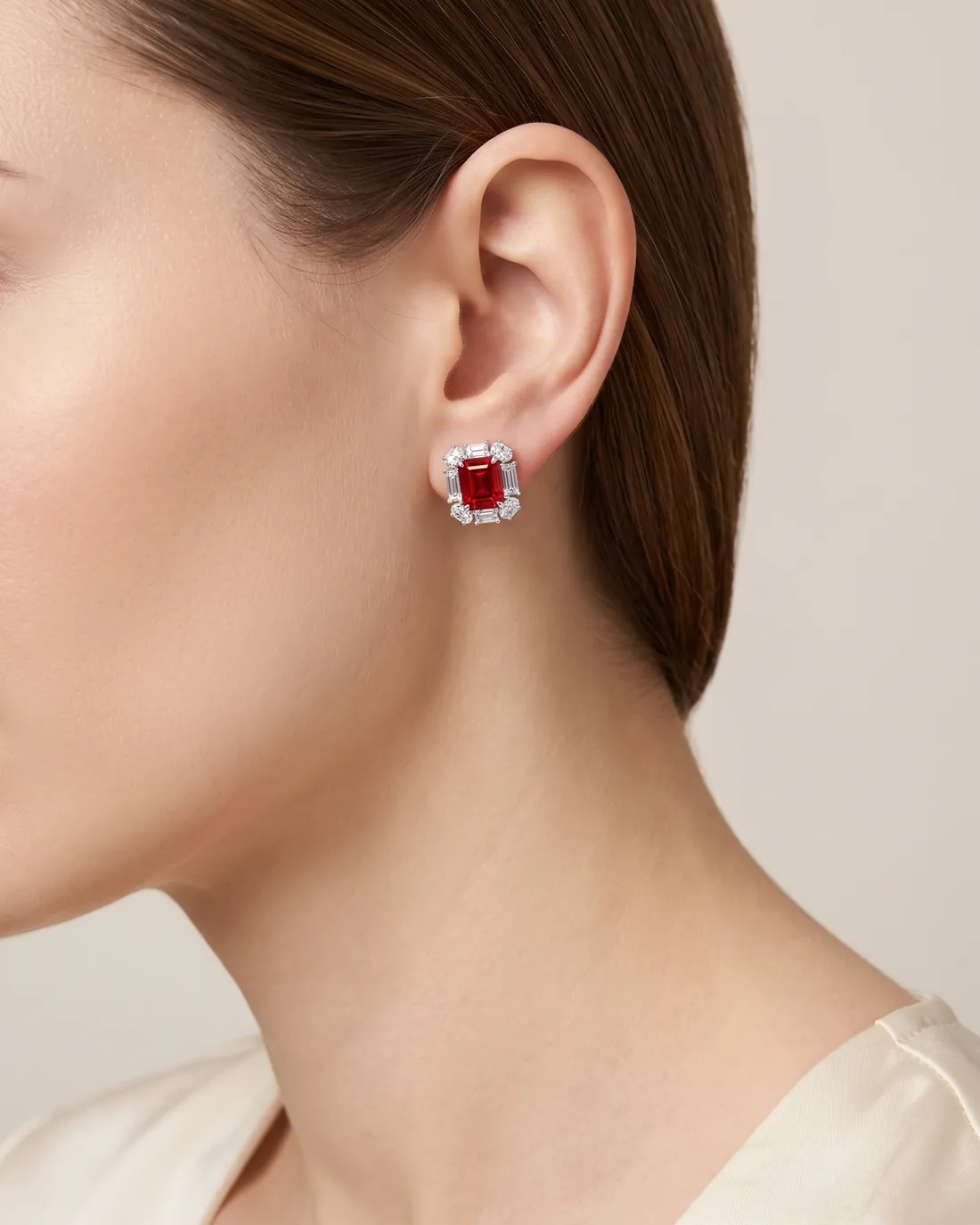 ORTIGAS Ruby Deco earrings, worn on the ear