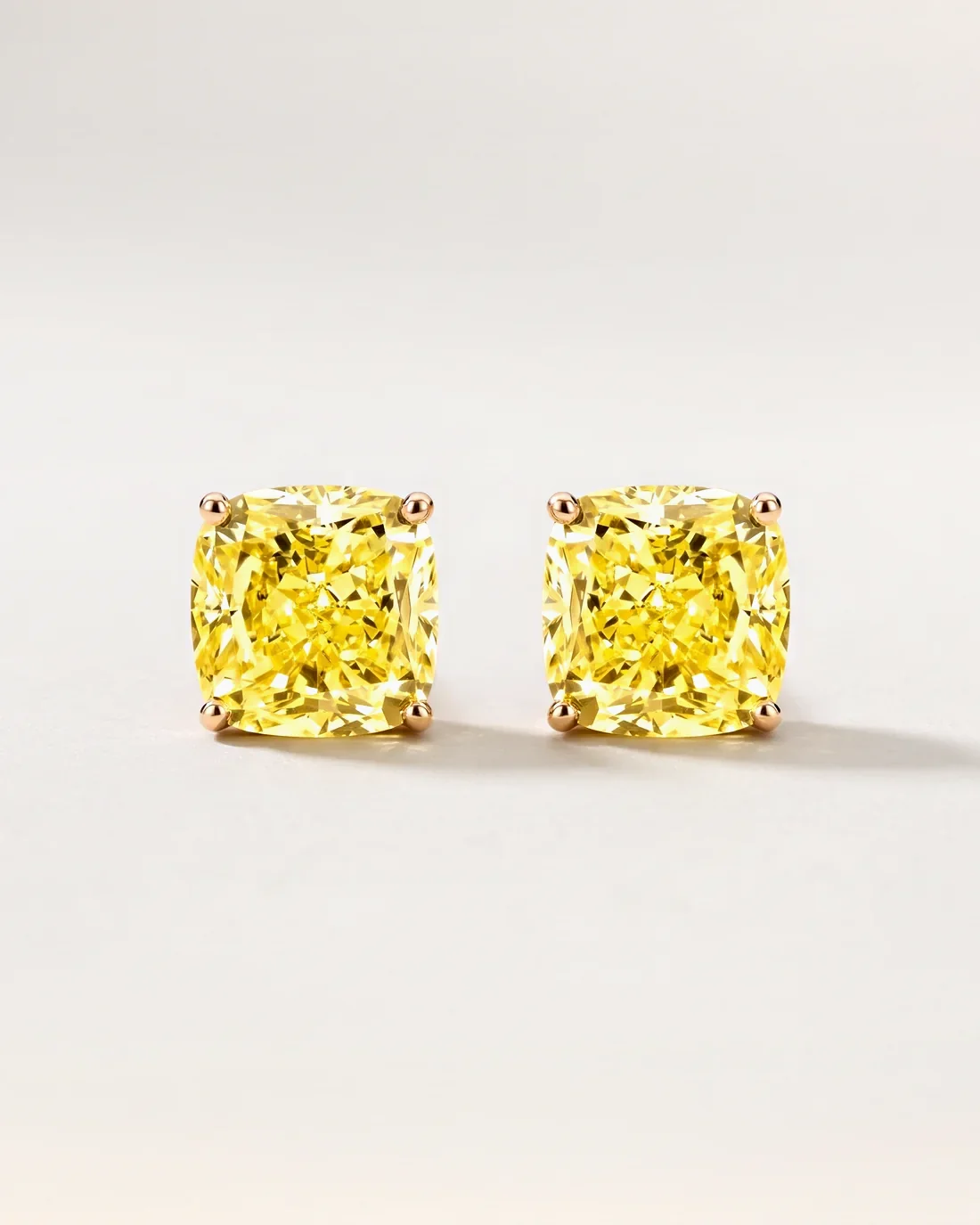 ORTIGAS Yellow Cushion Studs earrings, front view