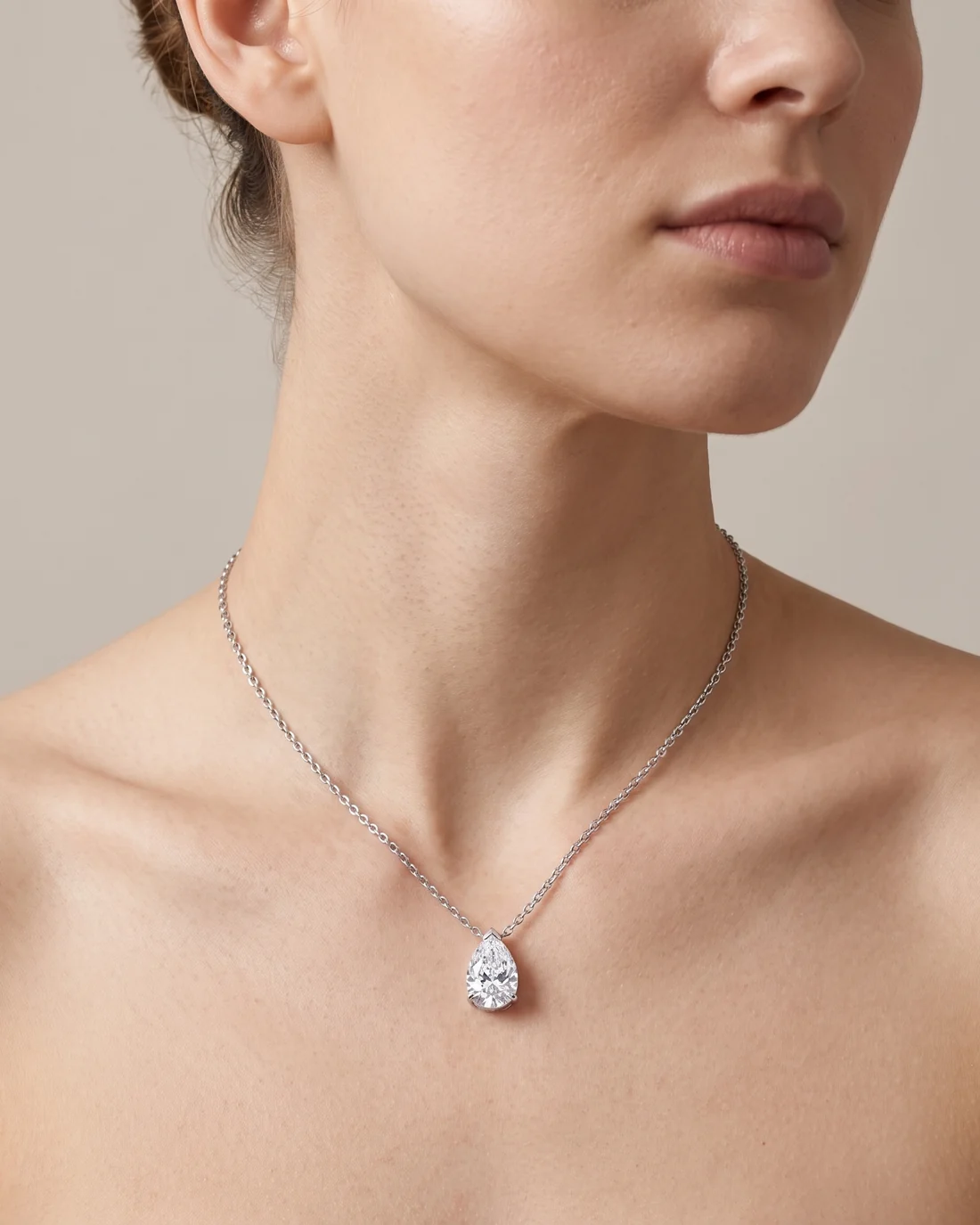 ORTIGAS Pear Pendant necklace, worn on the neck