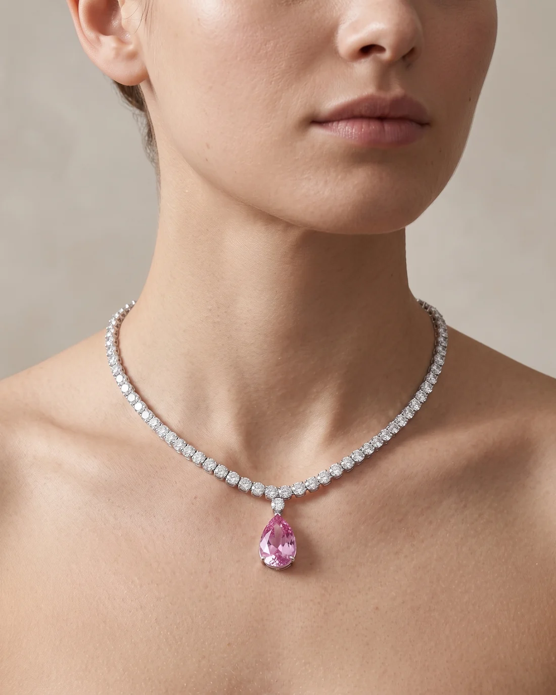 ORTIGAS Pink Pear Riviere necklace, worn on the neck