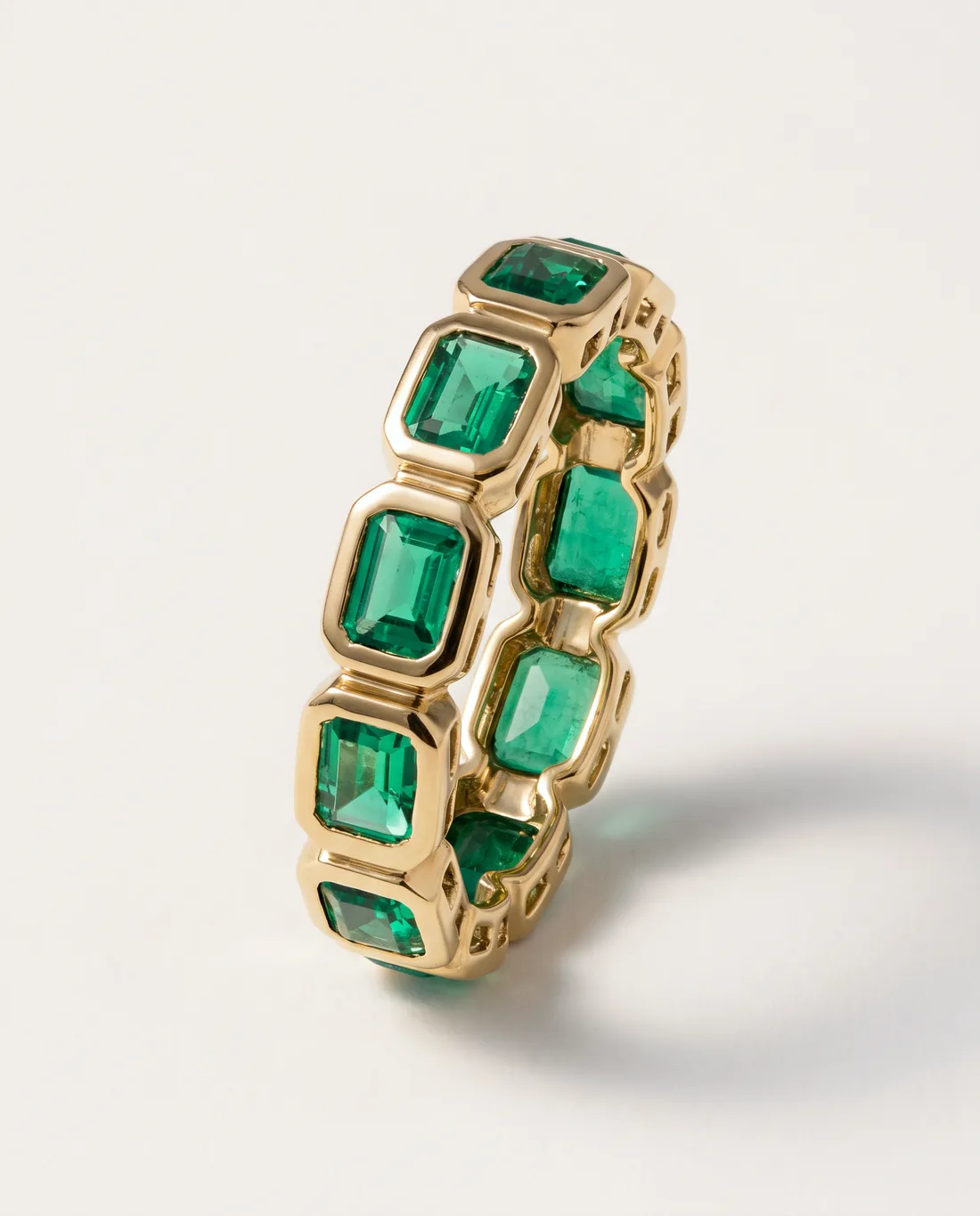 ORTIGAS Emerald Bezel Band ring, front view