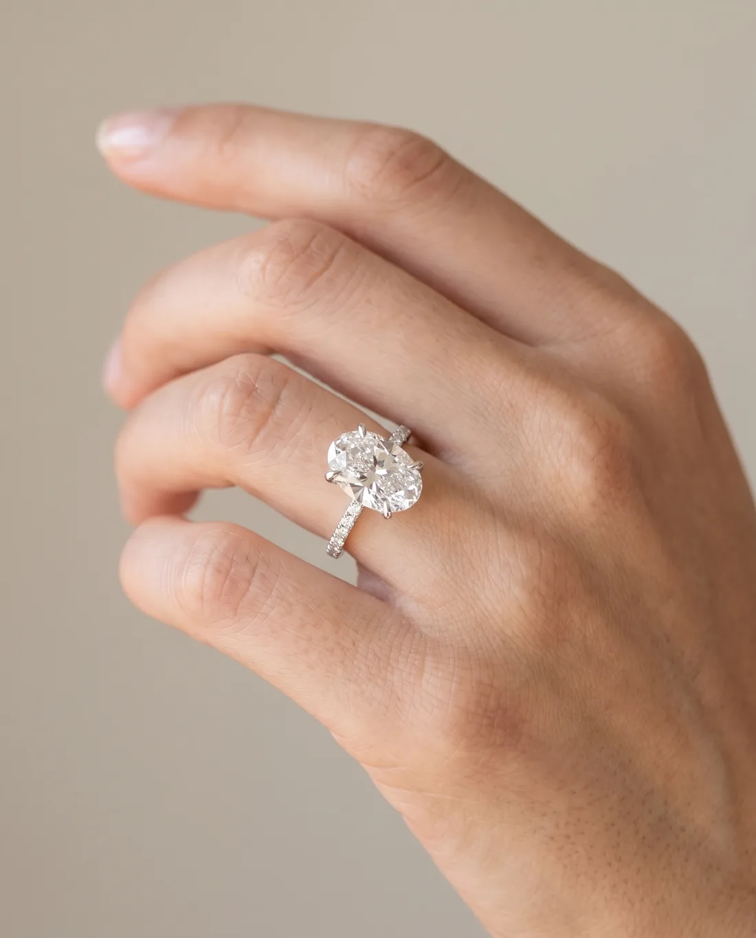 ORTIGAS Oval solitaire ring worn on the hand