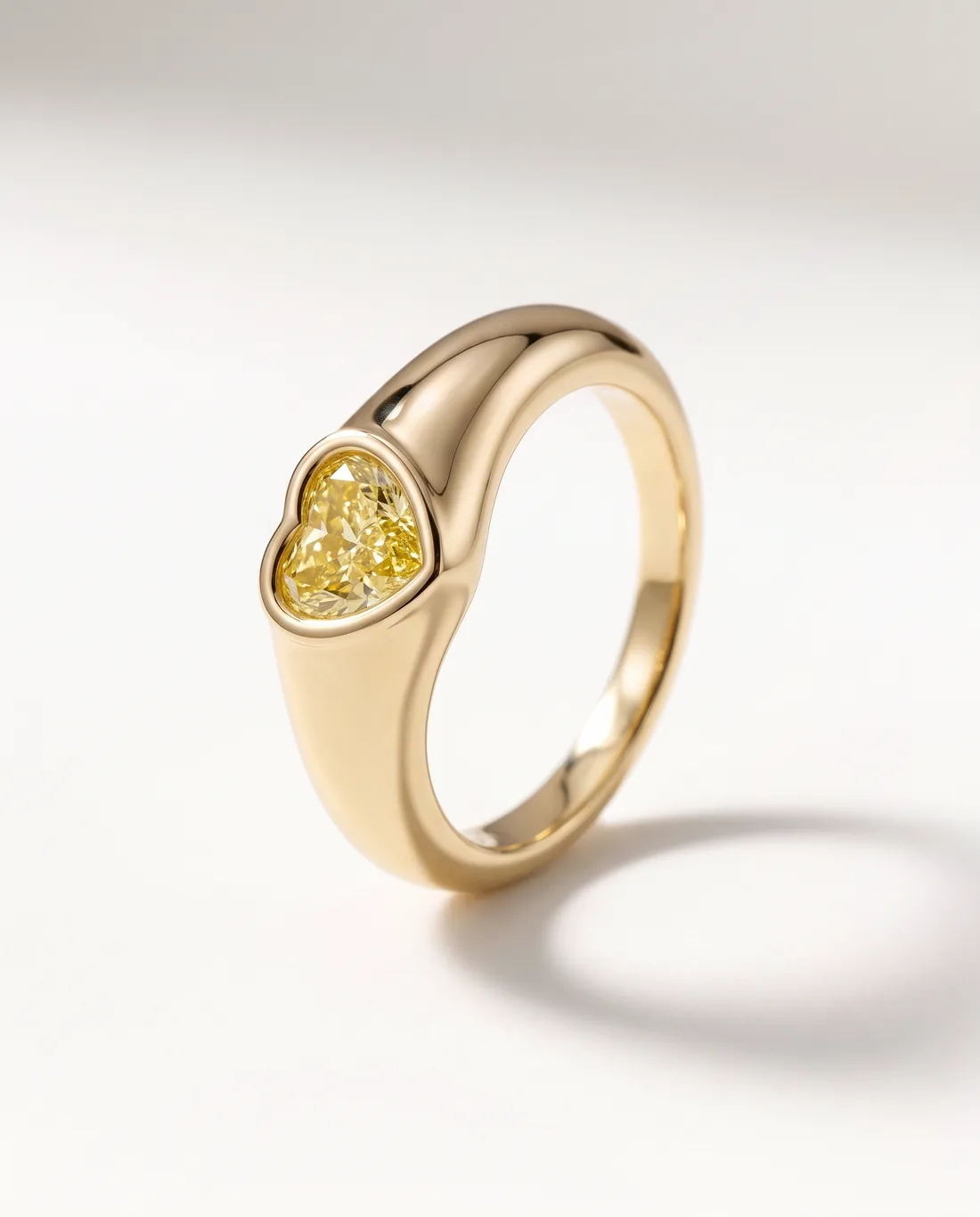 ORTIGAS Yellow Heart Signet ring, three-quarter view